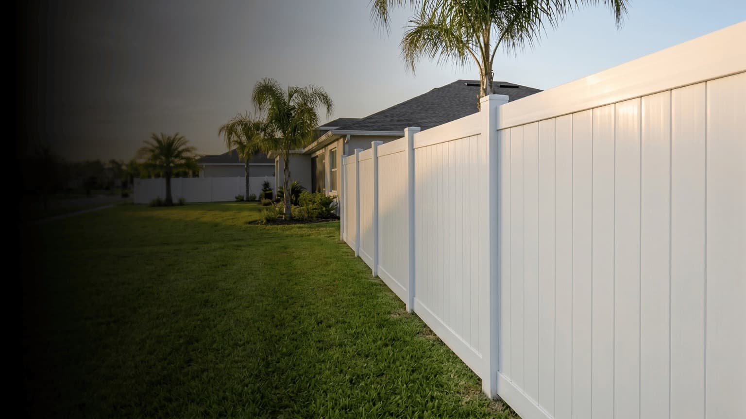 White vinyl privacy fence installed in a Central Florida backyard